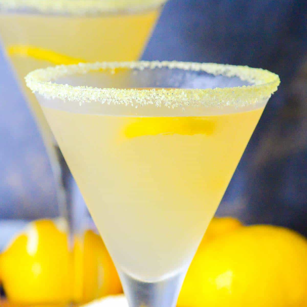 lemon drop martini with limoncello in a frosty class lined with superfine sugar