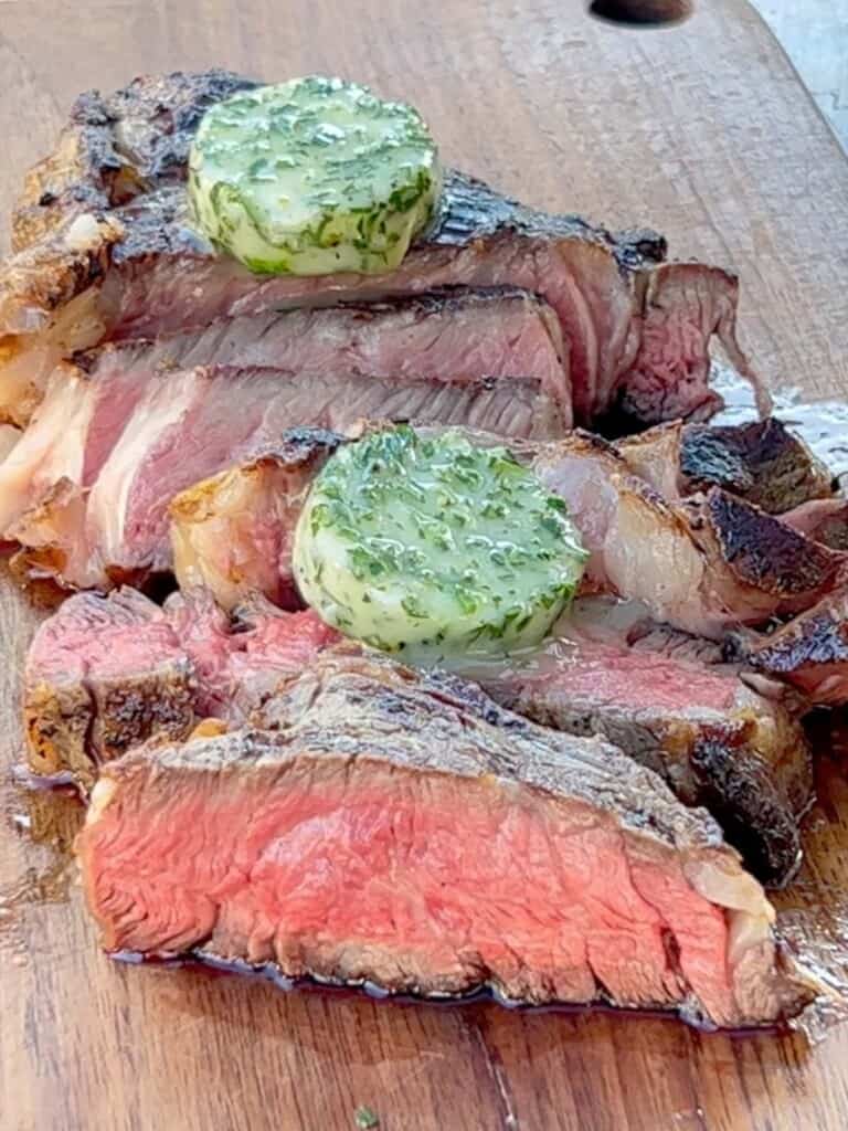 steak grilled and sliced. Served with compound butter