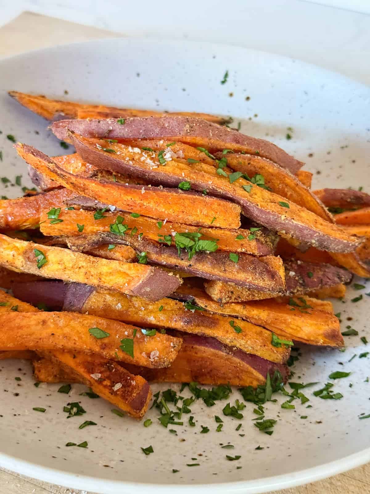 a plate of crispy sweet potato fires